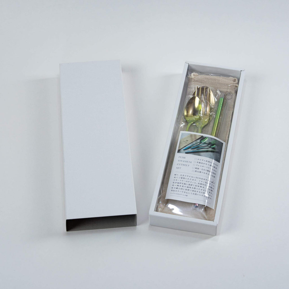 HORIE pink gradient pure titanium cutlery set presented in its paper gift box