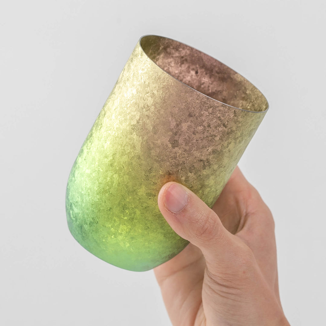 Hand holding the HORIE Kamazukuri Titanium Tumbler