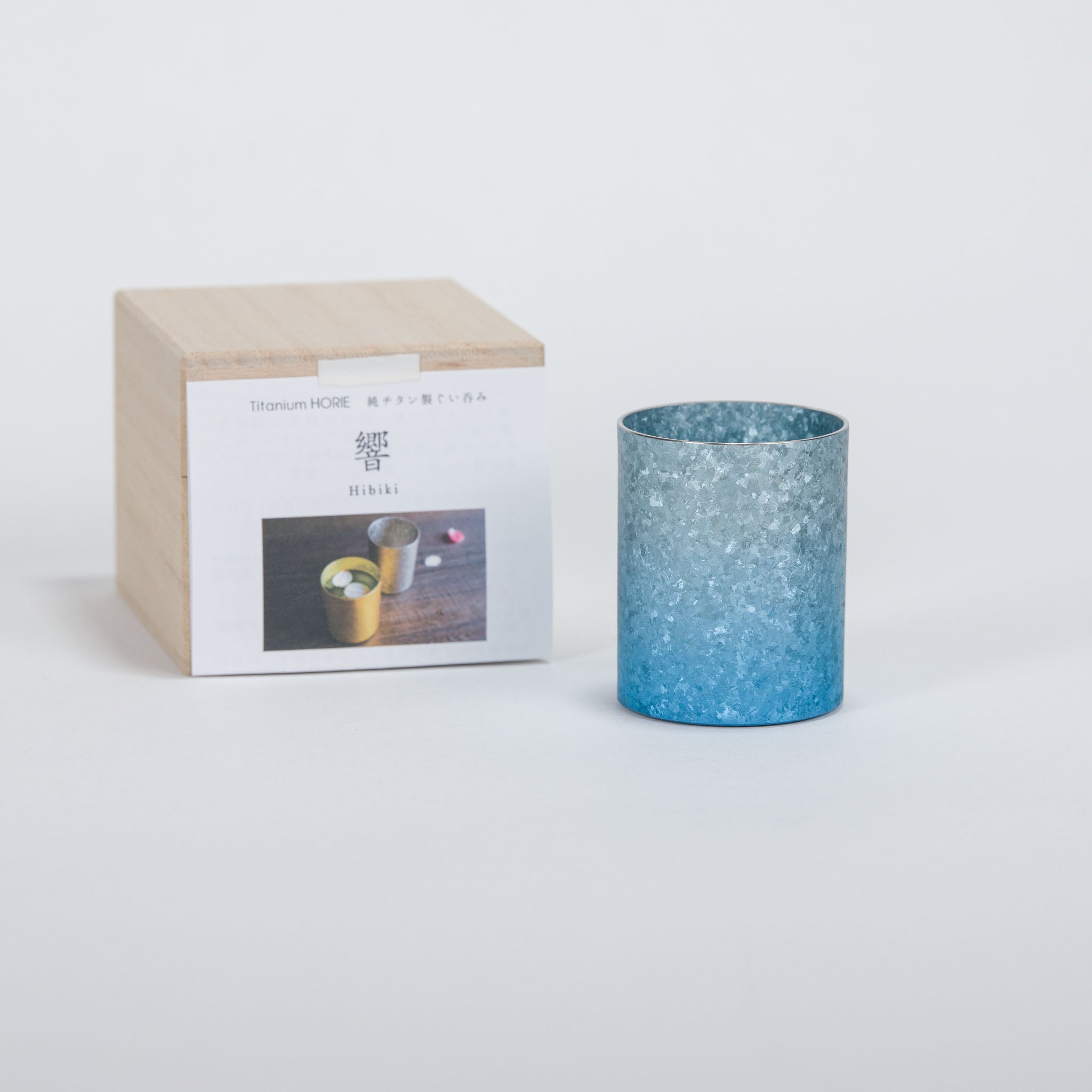 HORIE 60ml pure titanium sake cup in a stunning blue gradient finish with a handcrafted crystal-like texture, made in Japan.