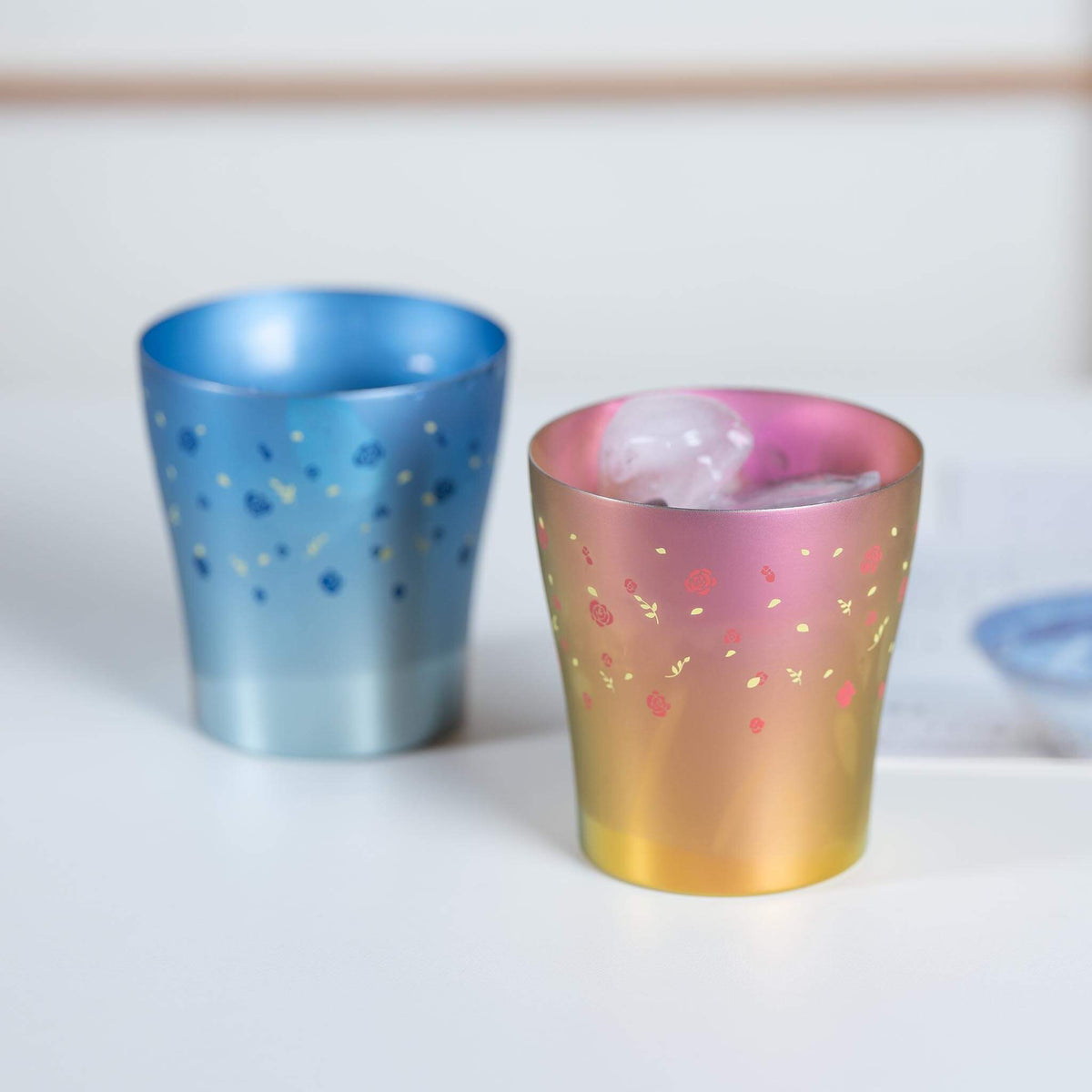 HORIE Hana blue and pink titanium tumbler pair served with ice
