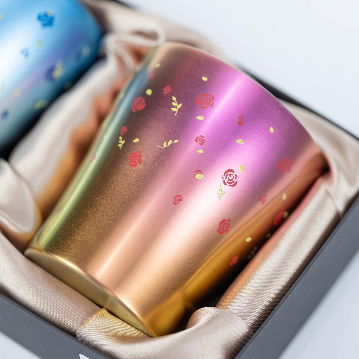 Close-up of the floral pattern on the pink HORIE Hana titanium tumbler