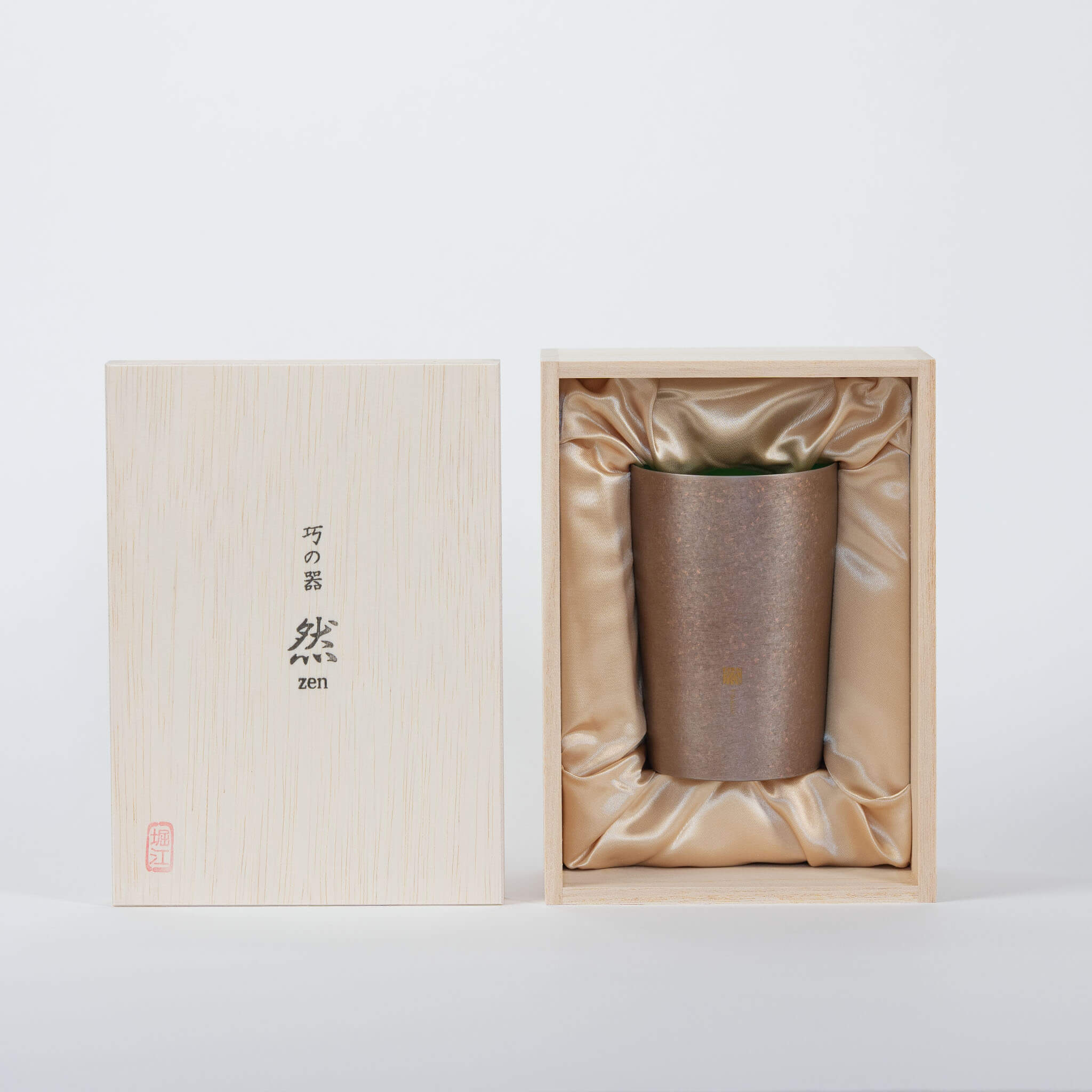 A traditional Japanese premium paulownia wooden gift box with Japanese kanji for the Horie Zen titanium tumbler series.