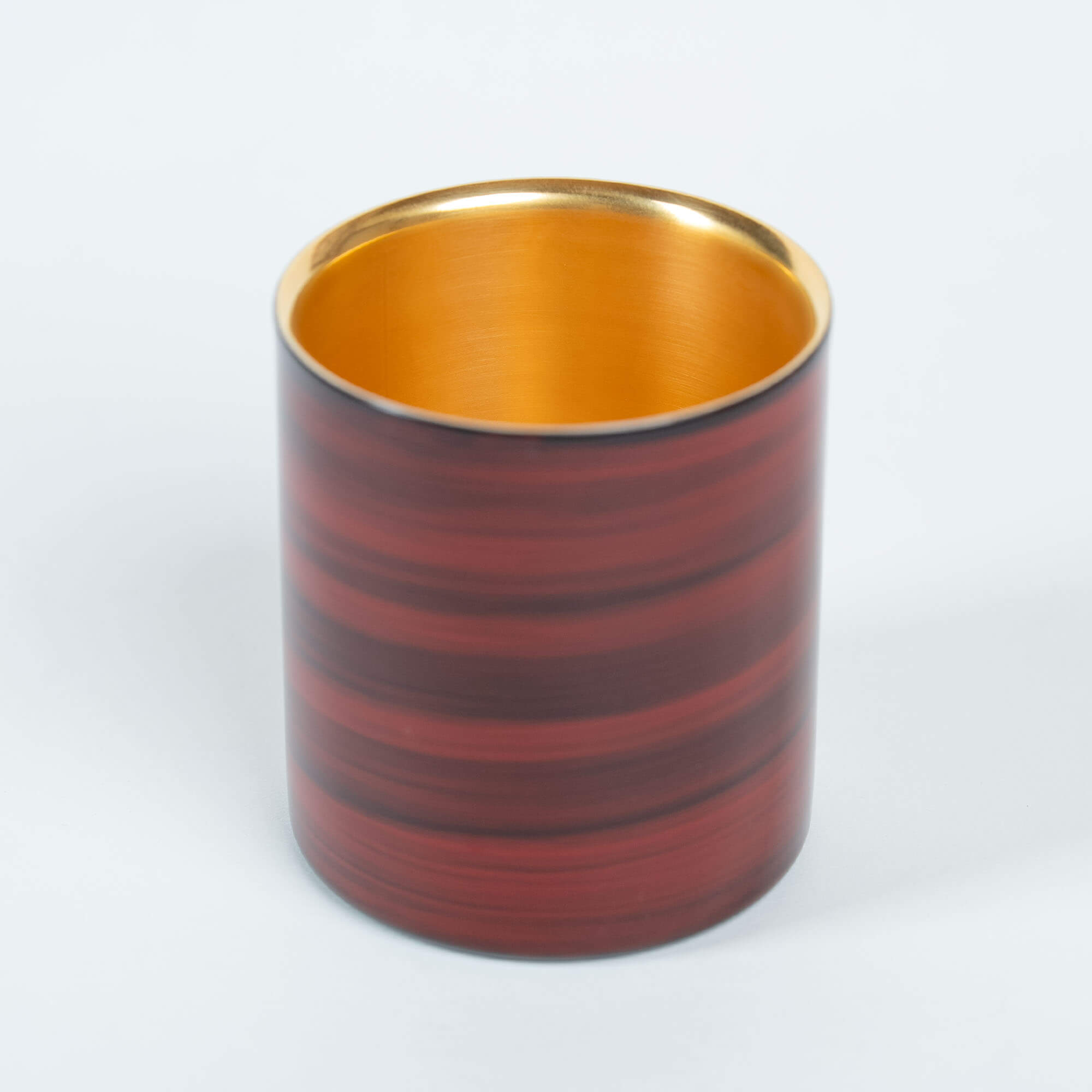 Front view of a red Japanese lacquered 250ml stainless steel sake cup