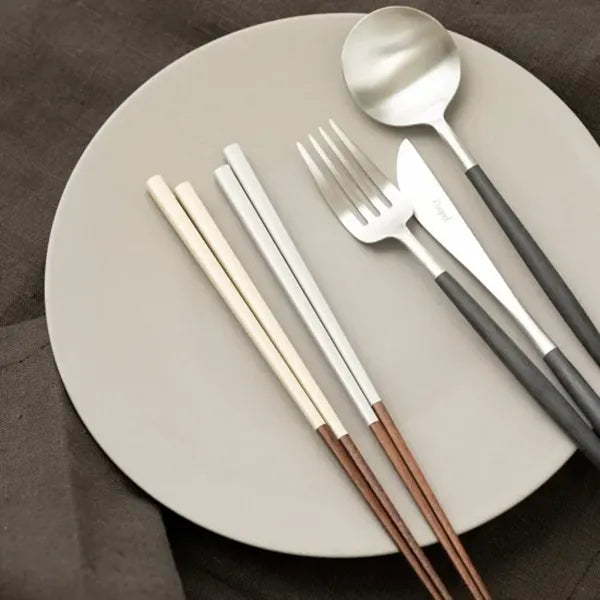 Natural Day chopstick gift set displayed on a plate, showcasing its stylish design.