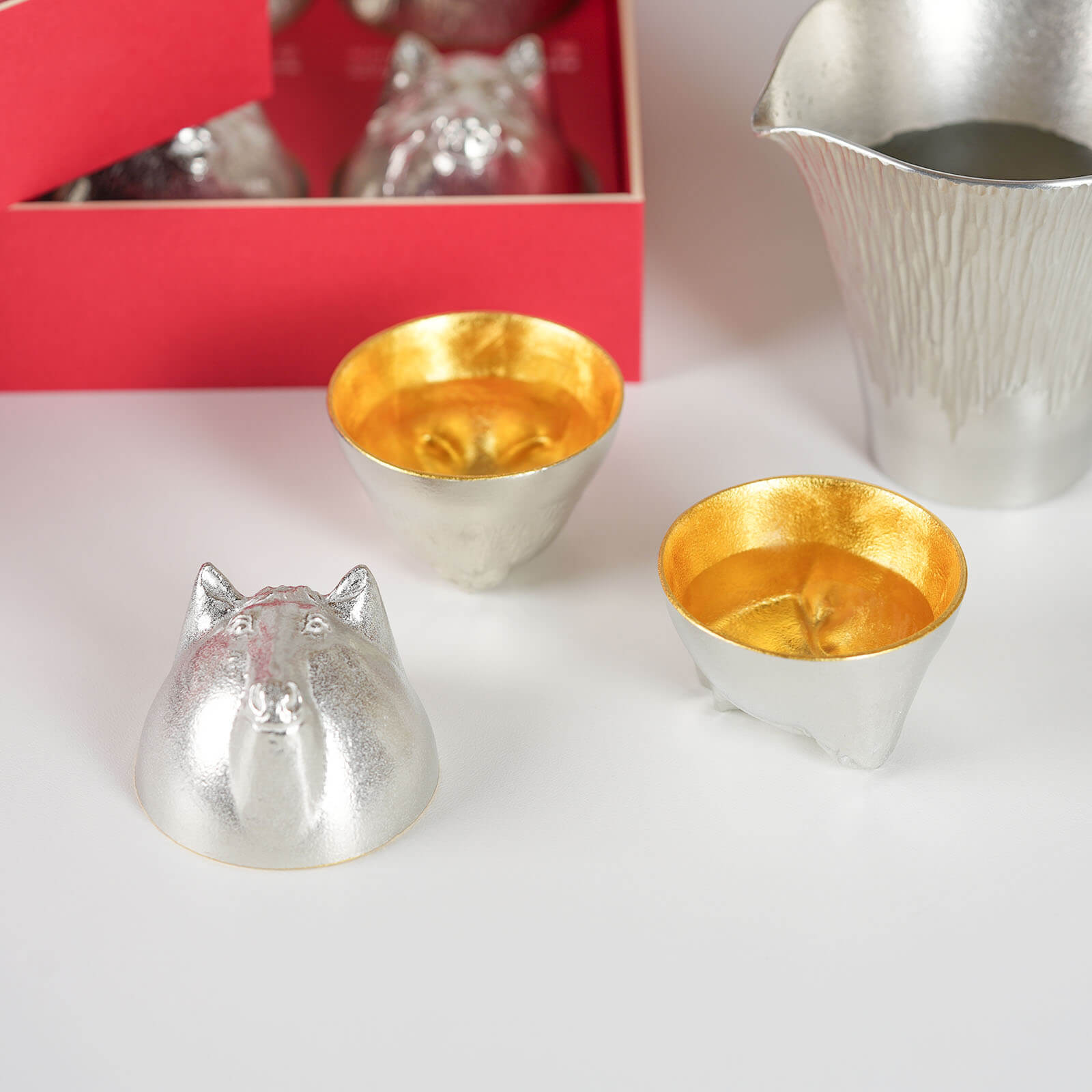 Nousaku 12 Chinese Zodiac Sake Cup Set with 24K Gold Leaf Finish - Authentic Japanese Tin Craftsmanship for Luxury Living.