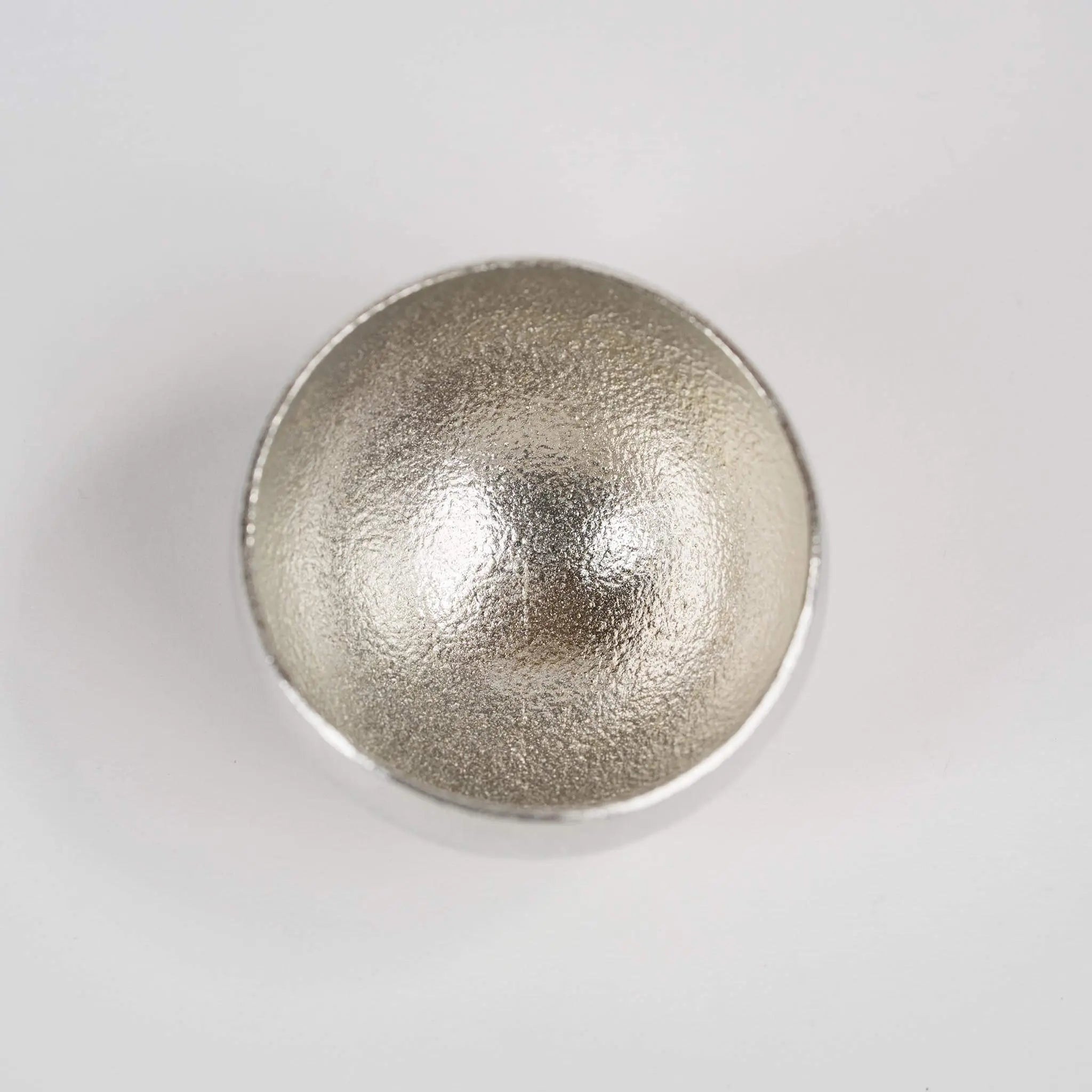 Top-down view into the 100% pure tin interior, showing the natural luster of the metal.