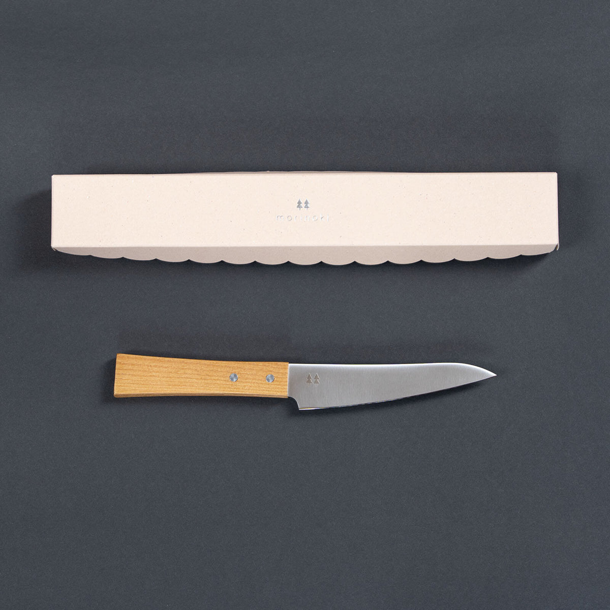 Shizuhamono Morinoki 4.7-inch petty knife beside its presentation box