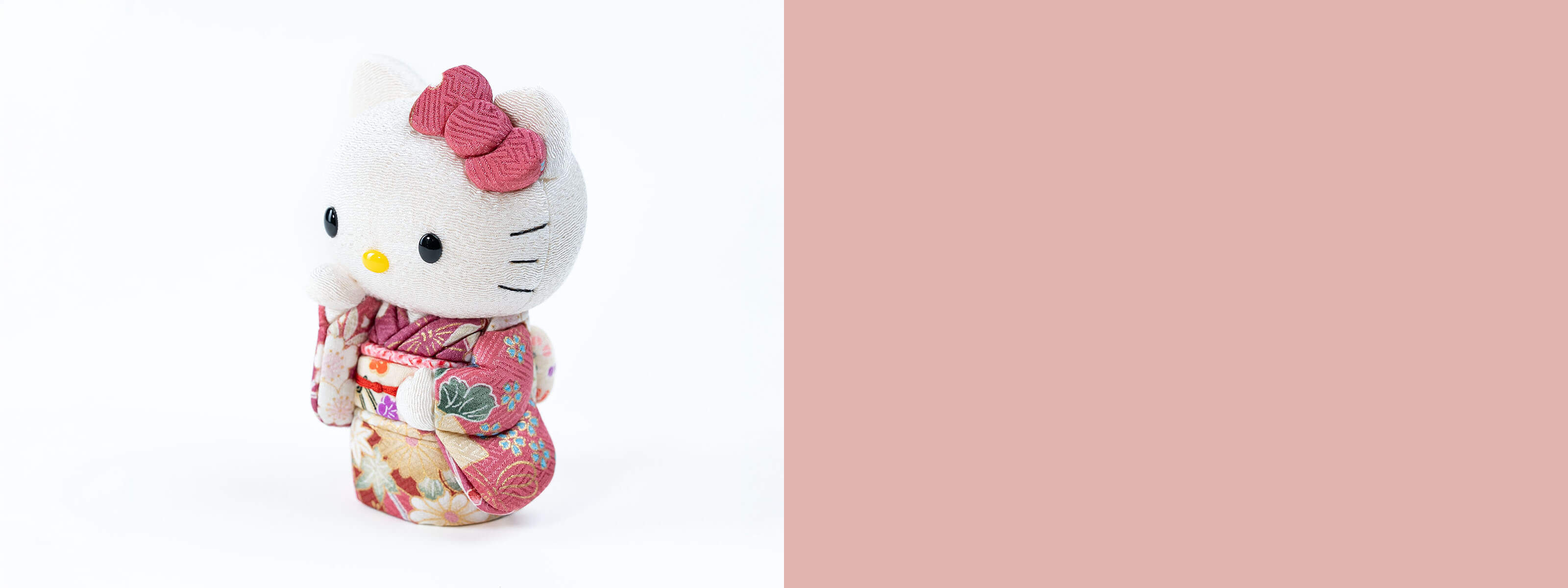 Adorable pink Hello Kitty plush doll, showcasing unique Japanese Kawaii culture. A perfect Japanese gift from KyotoLux with fast worldwide shipping.