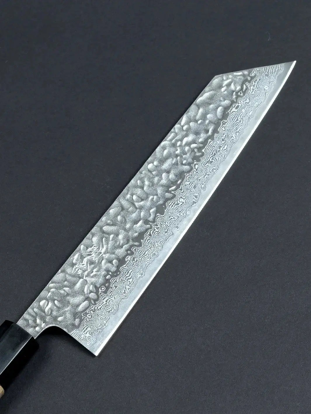 Close-up of the Sukematsu AUS10 Tsuchime Gyuto knife’s front blade