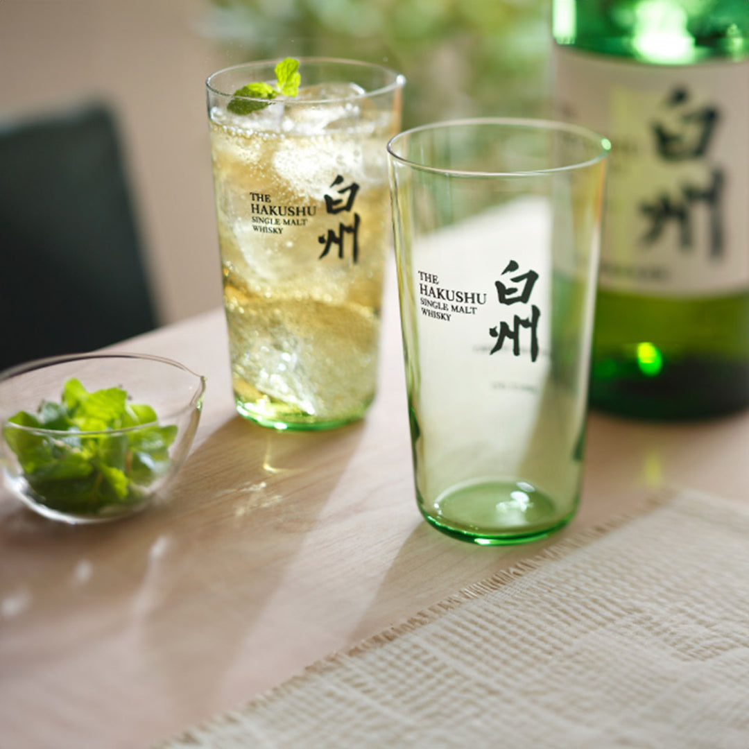 Suntory Hakushu Thin-Walled Tumbler on a table, showing whiskey filled inside