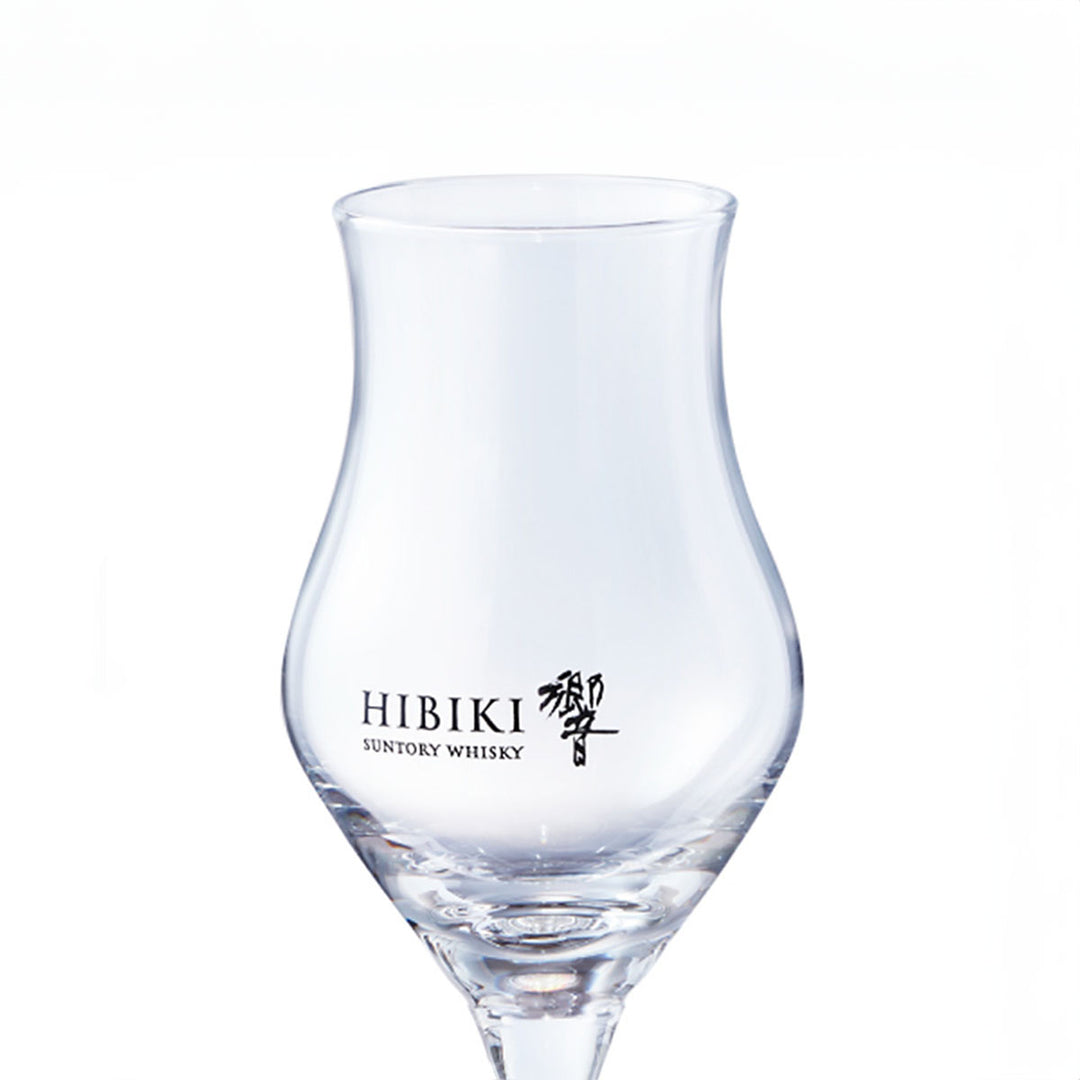 Side view of the Suntory Hibiki Tasting Glass - 105ml, showcasing the elegant stem and tulip shape.