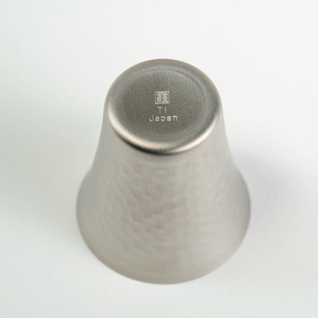 Bottom view of the Titanium Cold Sake Cup, highlighting the craftsmanship and durable titanium construction