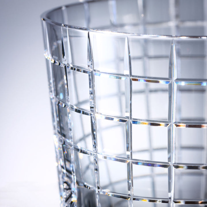 Close-up of Yamazaki × Takeo Kikuchi Crystal Rock Glass, emphasizing the fine grid-like cut pattern.